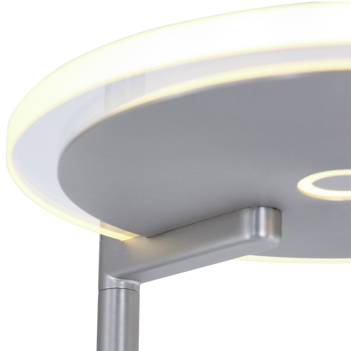 Gros plan sur la face inférieure du grand diffuseur rond et son éclairage LED.