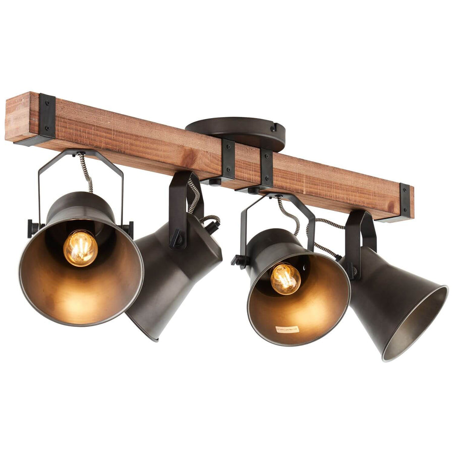 Vue en angle du plafonnier allumé, mettant en valeur les abat-jour coniques
