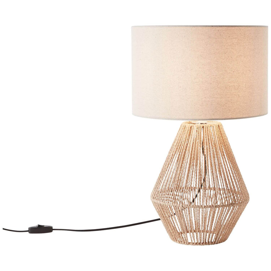 Lampe de profil avec câble noir et interrupteur visibles, présentée sur fond blanc.