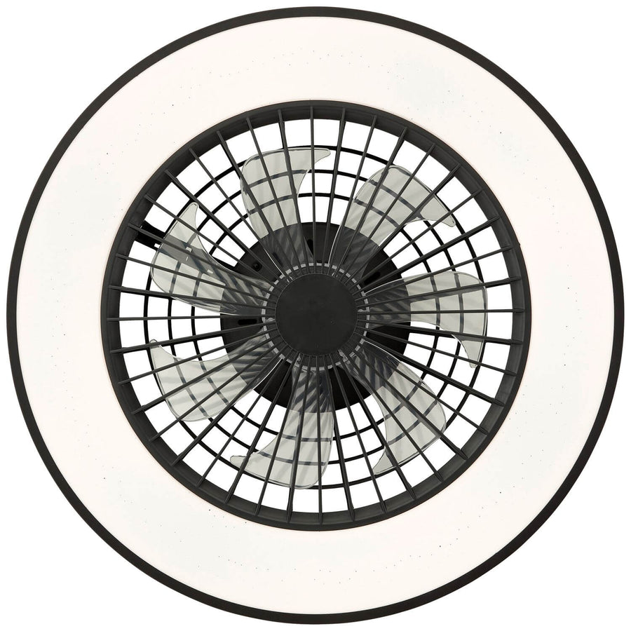 Vue de dessous en lumière blanche, pales transparentes derrière la grille circulaire