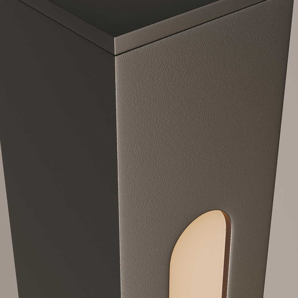 Détail de la finition taupe texturée et du diffuseur chaud en arche