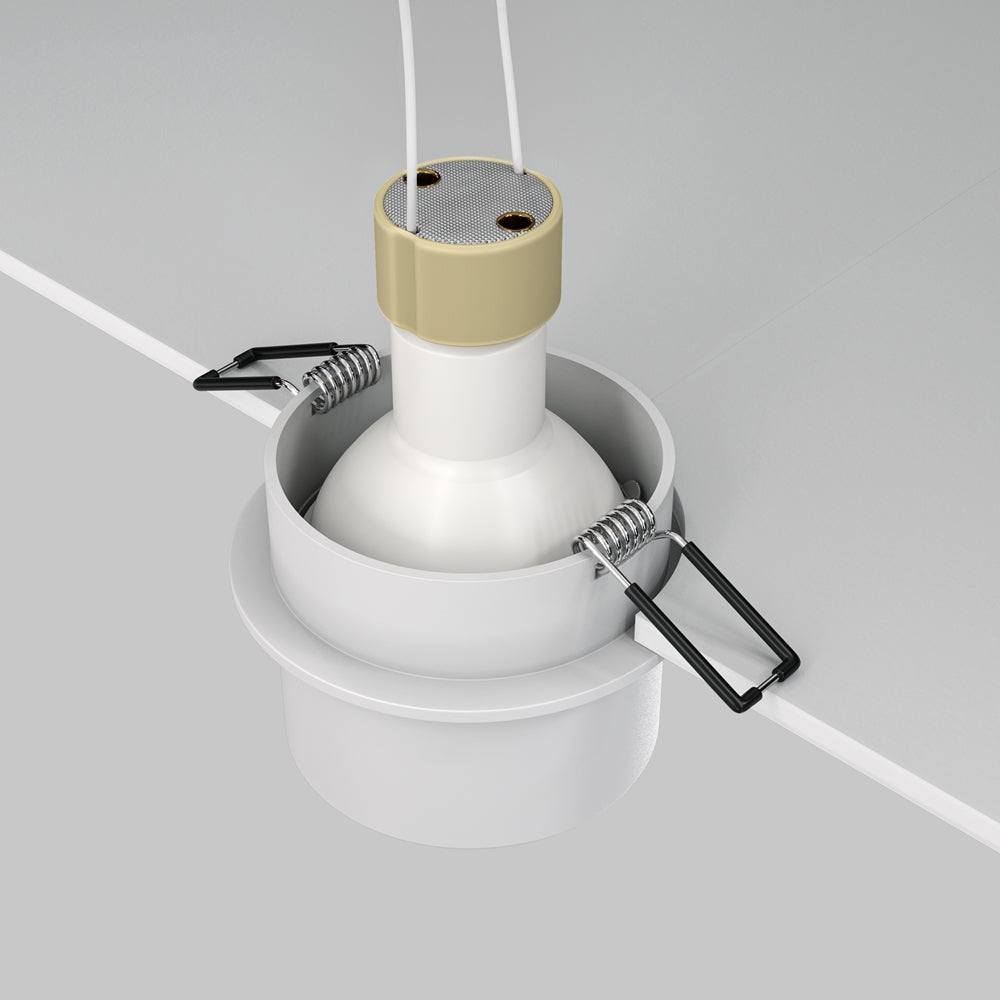 Vue technique du boîtier encastré avec ressorts de fixation et douilles de connexion