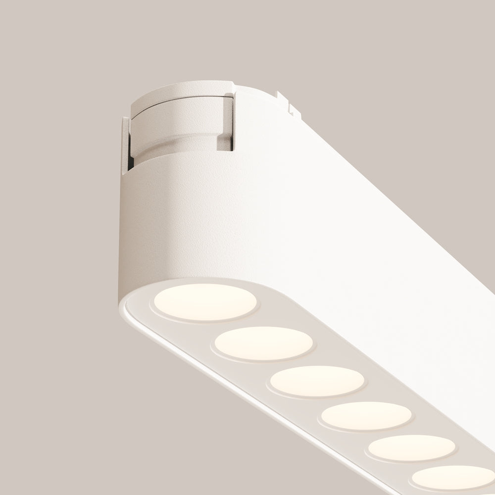 Détail rapproché de l'extrémité du projecteur blanc en fonctionnement