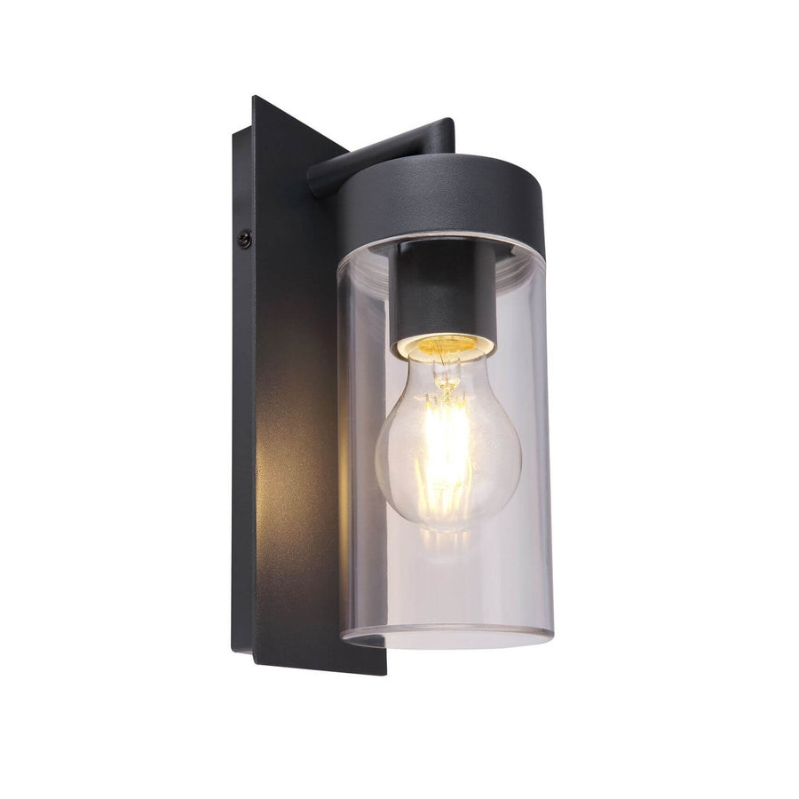 Luminaire extérieur anthracite avec verre cylindrique transparent et ampoule visible, présenté sur fond blanc.