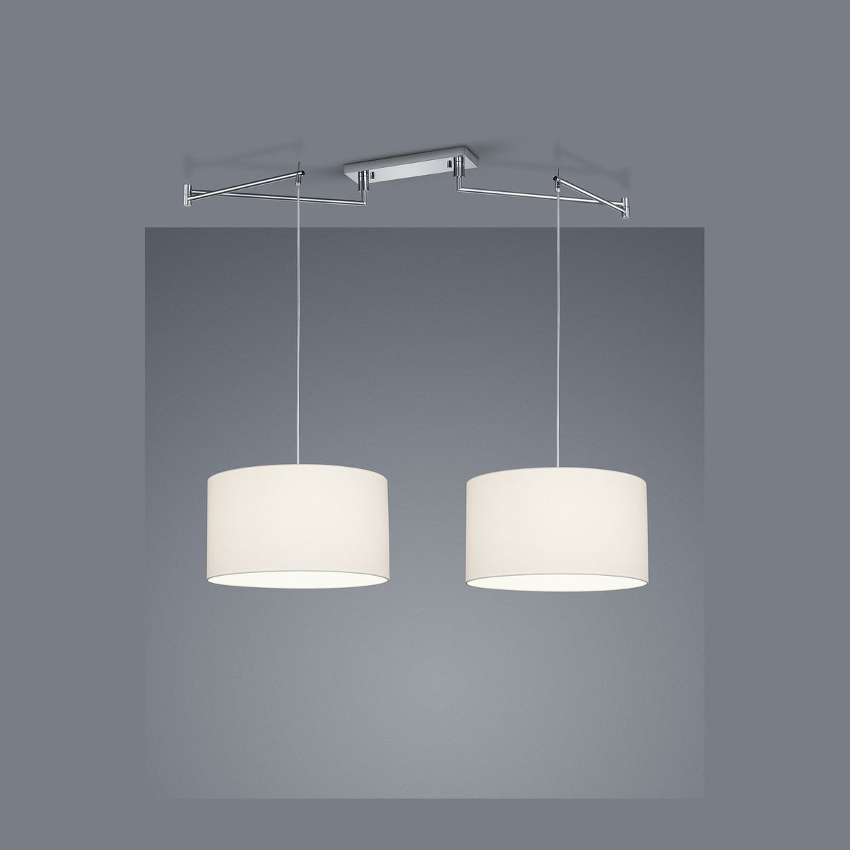 Suspension chromée à deux abat-jours cylindriques blancs suspendus, vue de face sur fond gris.