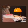 Lampe à poser Cato orange et dorée mat, verre