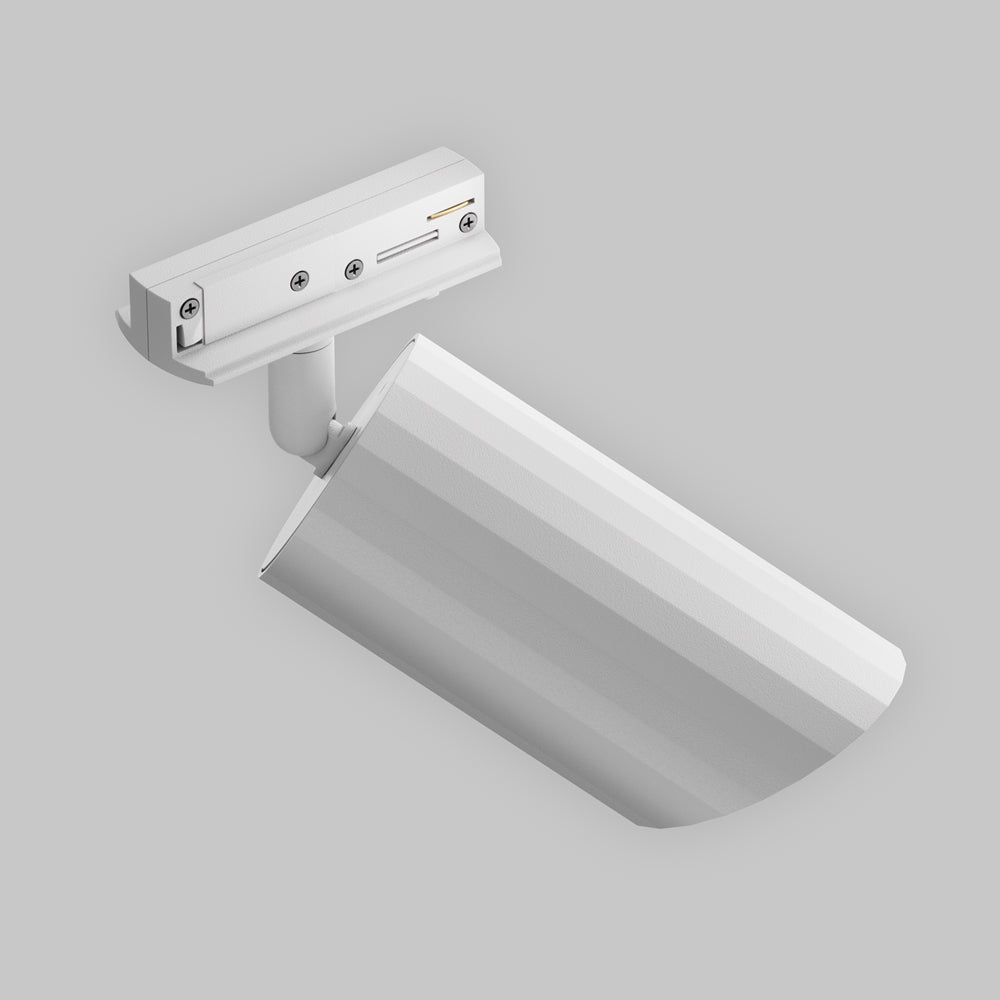 Vue de dessus du projecteur blanc et de son adaptateur à vis apparentes.