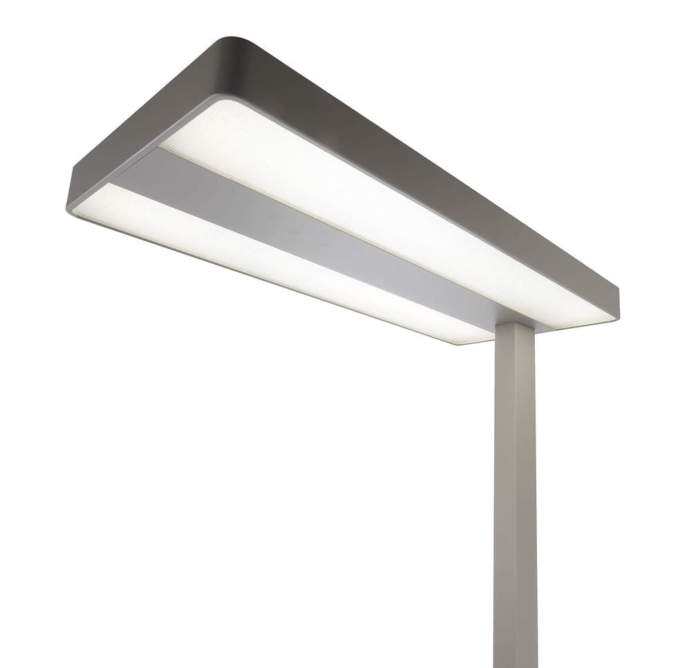 Détail de la tête lumineuse rectangulaire, diffuseur blanc et cadre aluminium.
