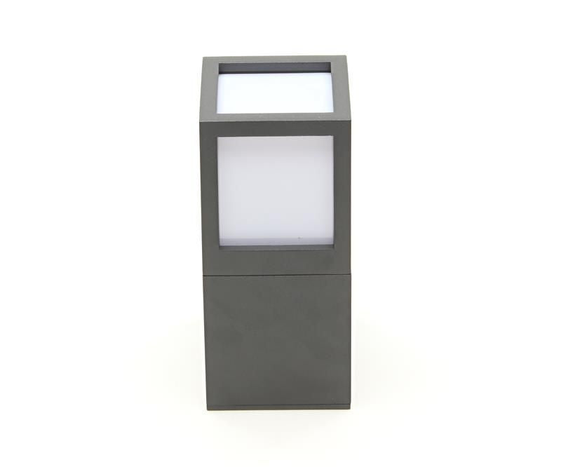 Vue de face du luminaire anthracite allumé, diffuseur blanc et socle carré