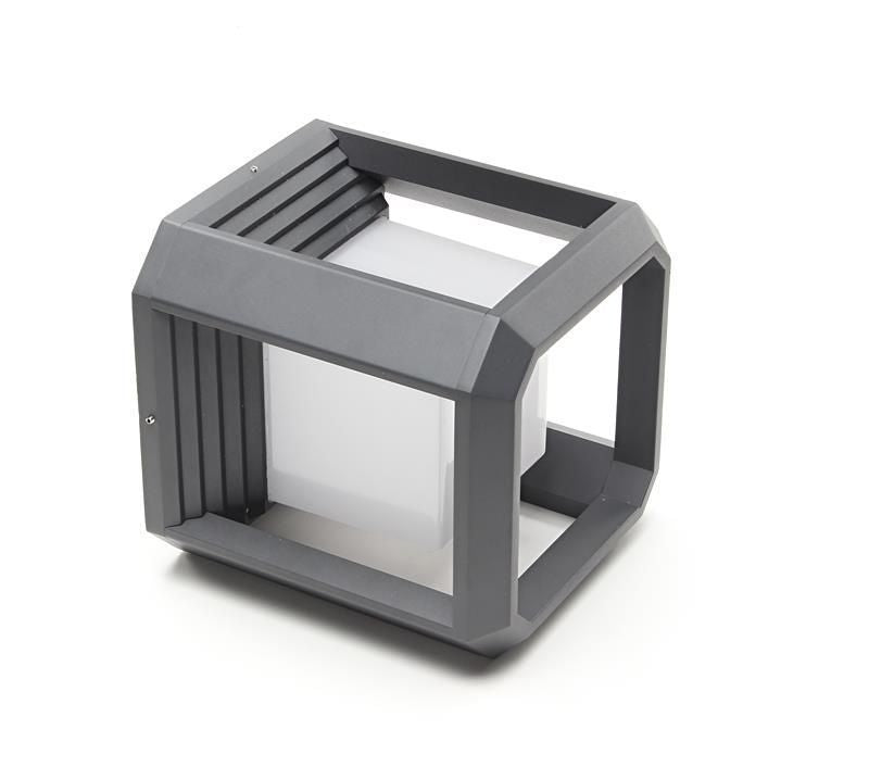 Vue en plongée du cadre gris ouvert et du cylindre diffuseur blanc intérieur.