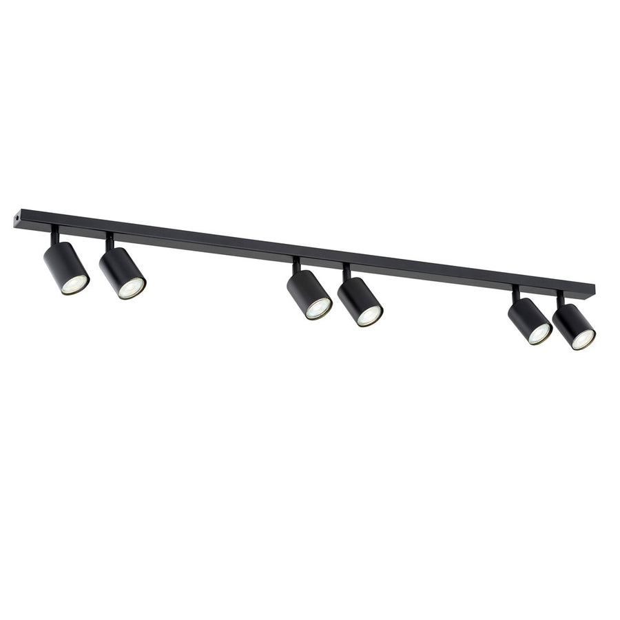 Luminaire noir à six spots cylindriques alignés sur un rail, vu de face sur fond blanc.