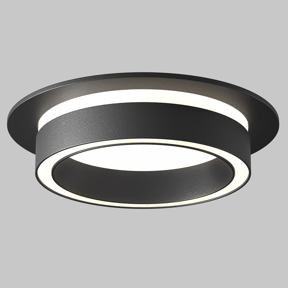 Vue de trois quarts montrant la bague noire et le double halo lumineux