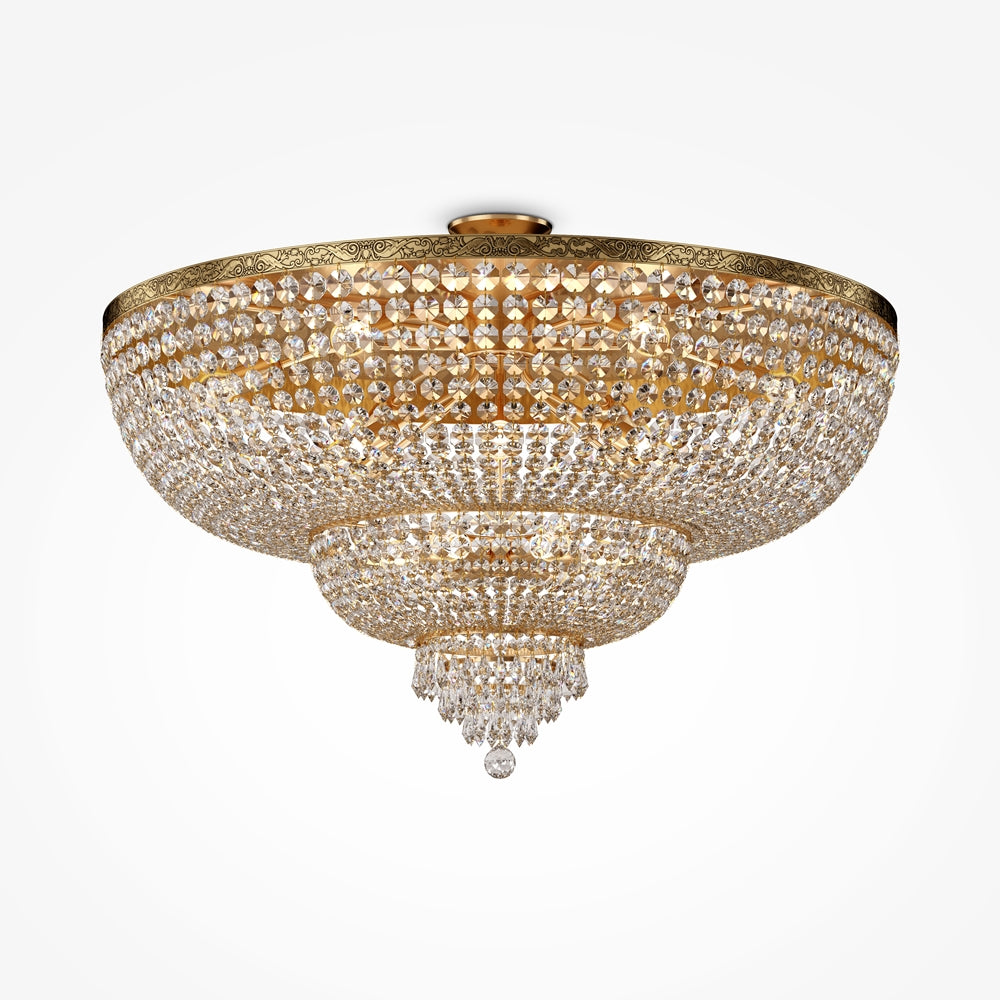 Vue de face du lustre doré en coupe monté au plafond
