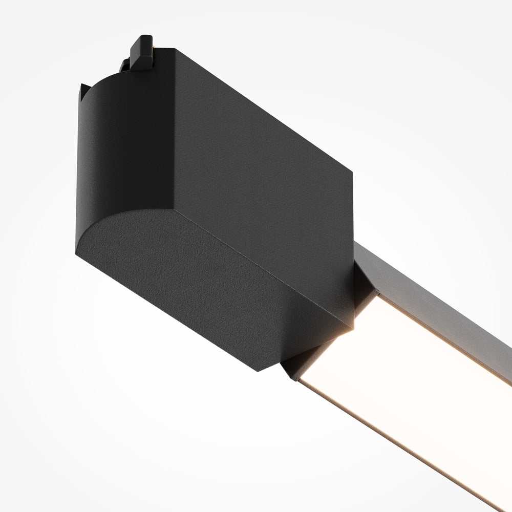Détail rapproché de l'embout noir mat texturé et du diffuseur lumineux