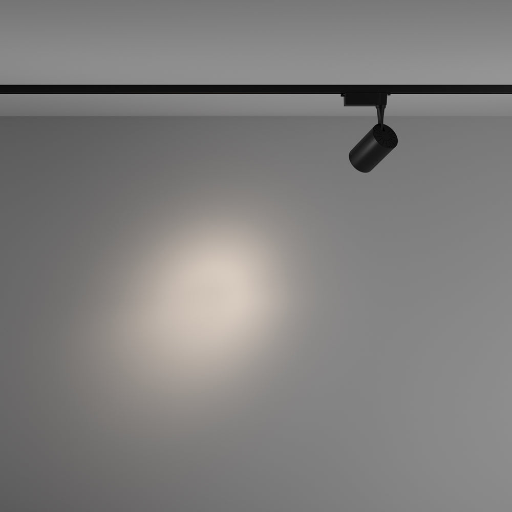 Mise en ambiance avec faisceau lumineux diffus projeté sur un mur gris