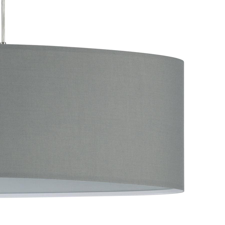 Détail rapproché de la texture du tissu gris et de l'intérieur blanc