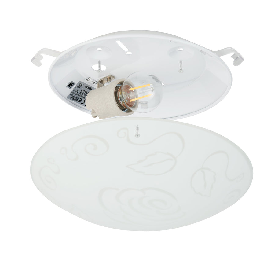 Vue de dessous du luminaire ouvert, douille, ampoule LED et fixations au plafond visibles.