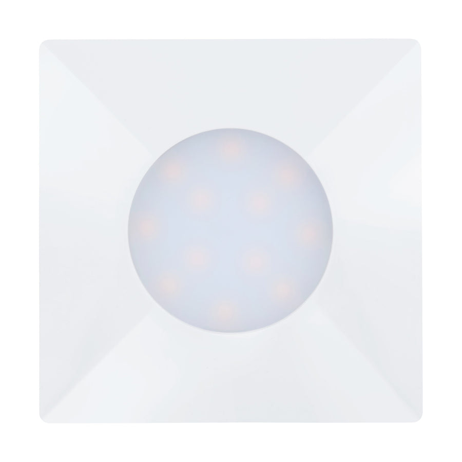 Vue de face du spot blanc montrant la plaque carrée et les LED réparties en cercle.