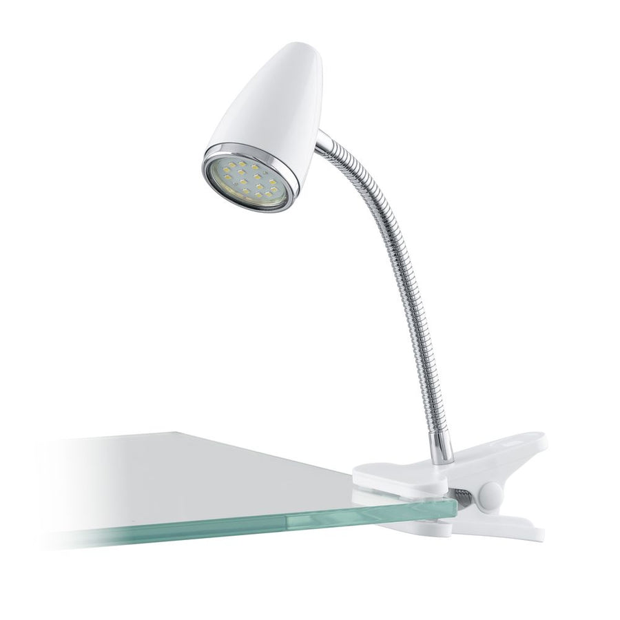 Lampe blanche et chromée fixée sur une plaque de verre, tête orientée vers le bas.