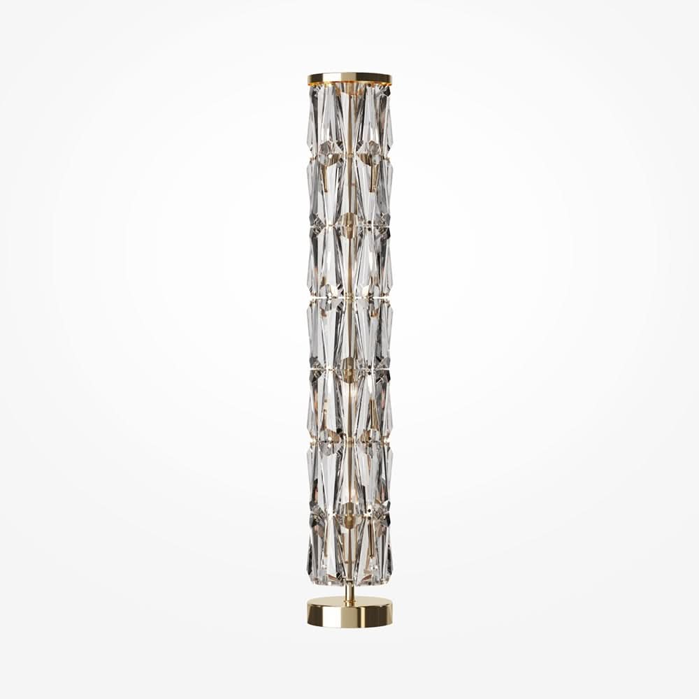 Colonne lumineuse verticale dorée, longs prismes de cristal empilés sur socle rond