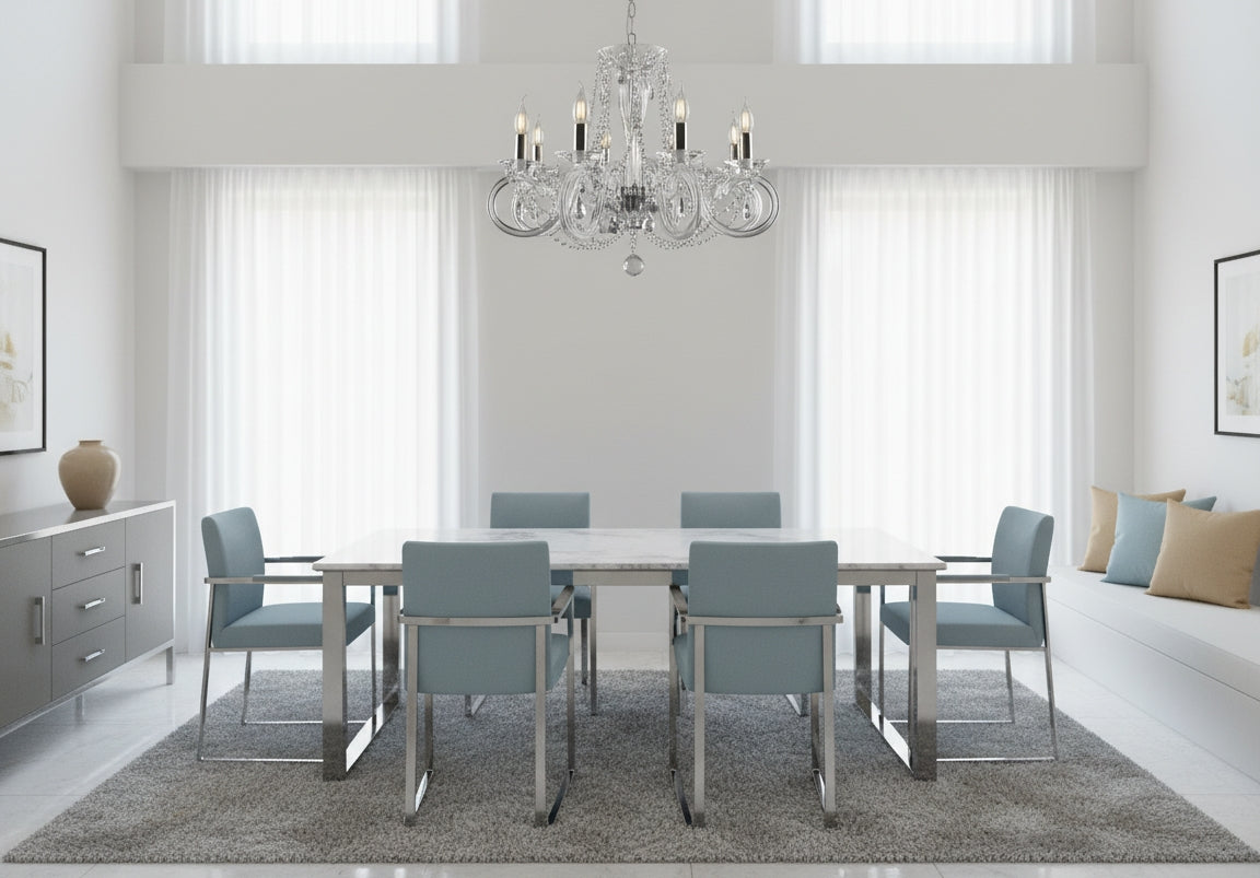 Lustre suspendu au-dessus d'une table de salle à manger blanche et moderne