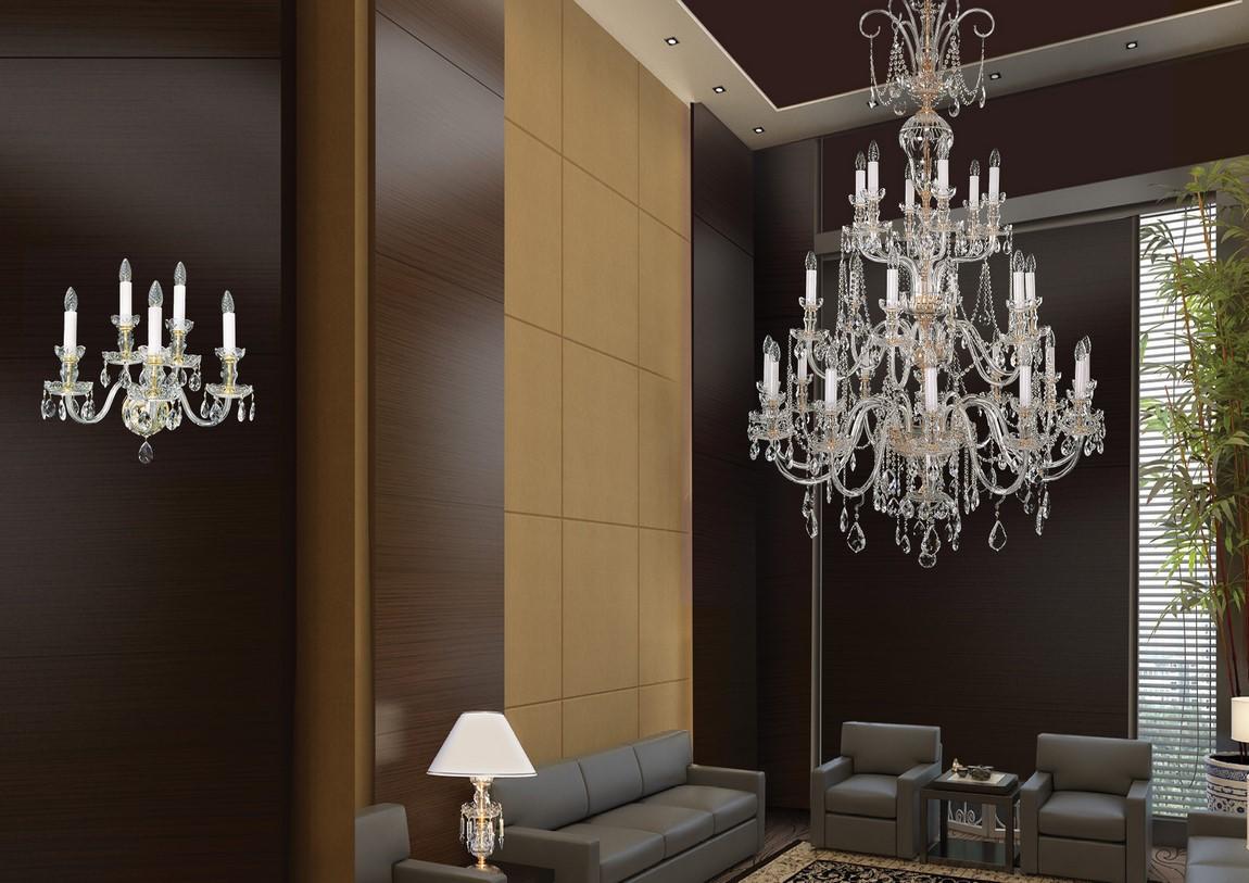 Mise en ambiance salon moderne avec applique cristal murale et grand lustre suspendu