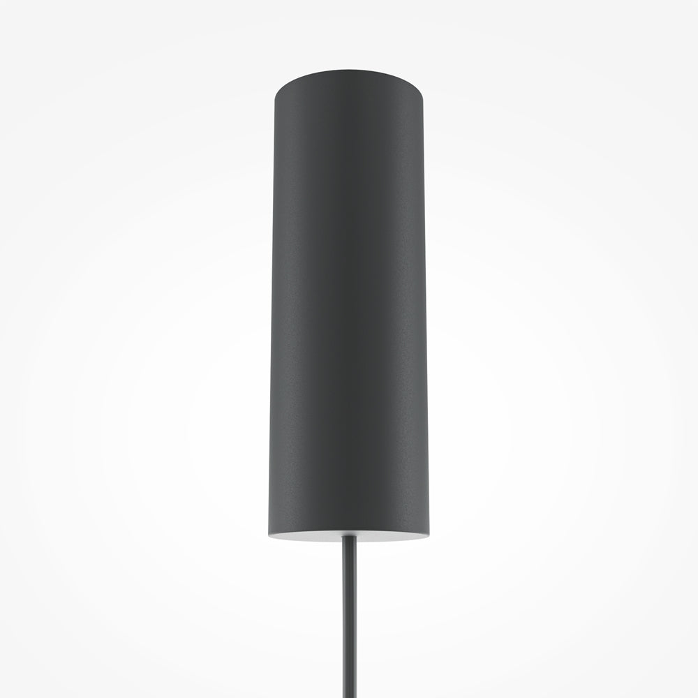 Détail de la rosace cylindrique noire fixée au plafond avec son câble