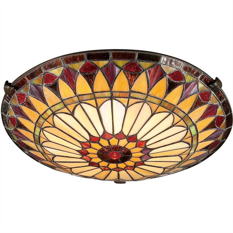 Vue de dessous dévoilant la fleur complète en verre jaune ivoire et rubis