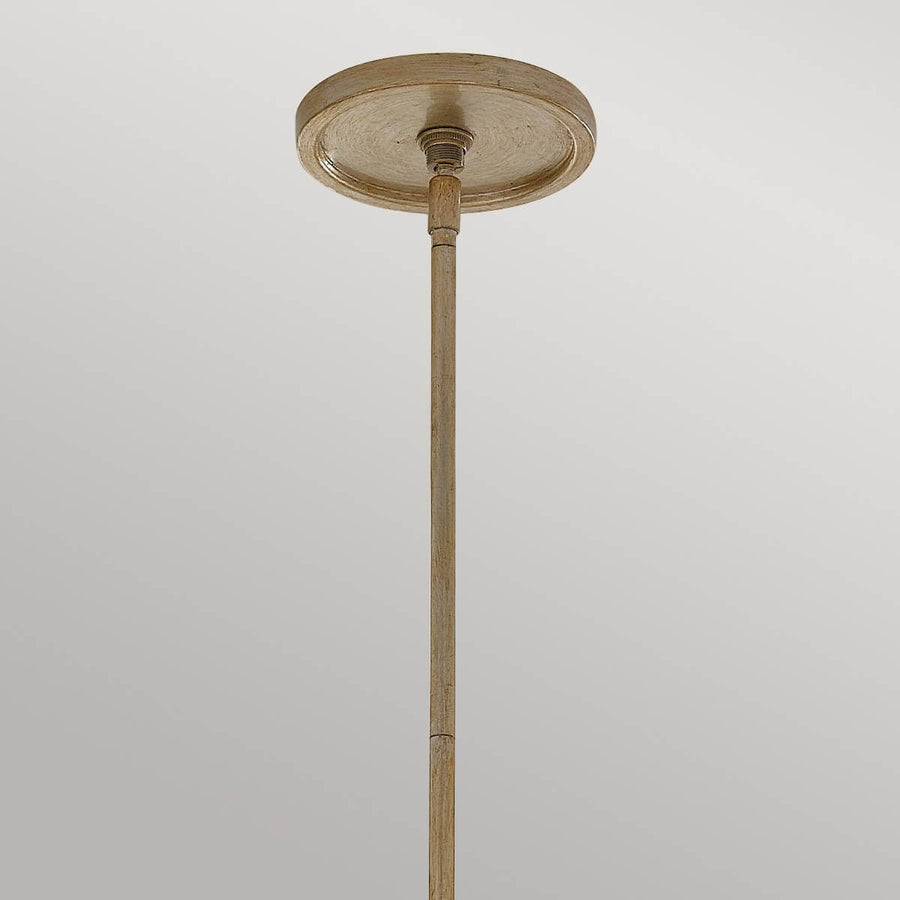 Détail de la rosace ronde et du départ de tige fixés au plafond