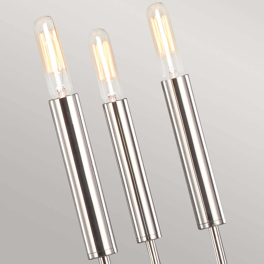 Détail des douilles cylindriques et des ampoules allumées émettant une lumière chaude
