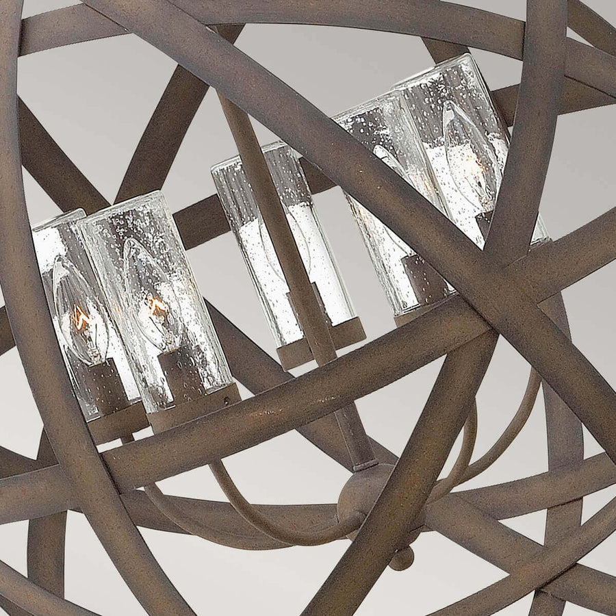 Détail des cinq ampoules et des verres cylindriques texturés à l'intérieur de la sphère