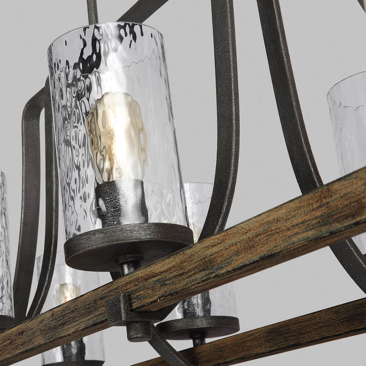 Détail rapproché du verre texturé et de la barre en bois brut
