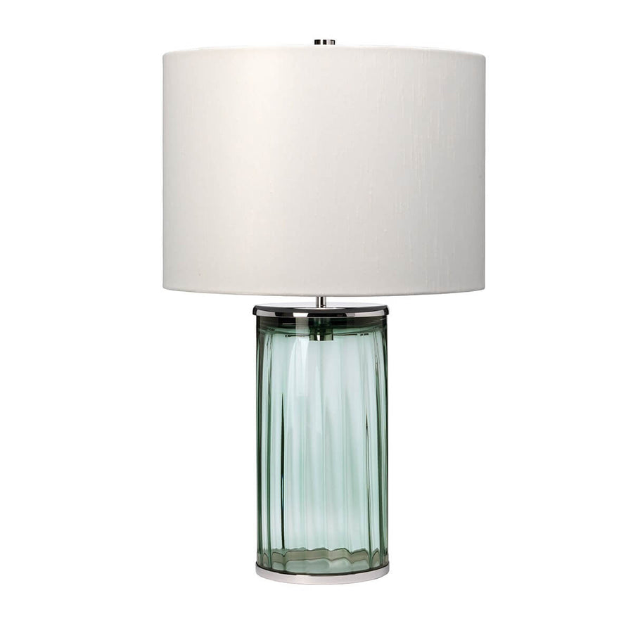 Vue de face de la lampe à poser, abat-jour blanc et base en verre vert.