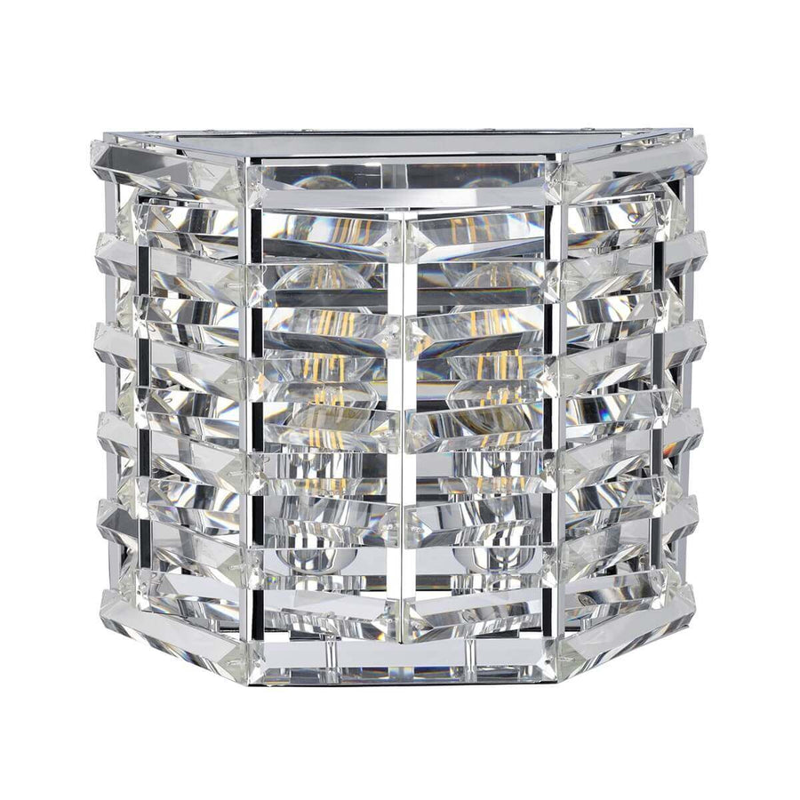 Luminaire mural allumé montrant deux ampoules derrière les plaquettes de cristal