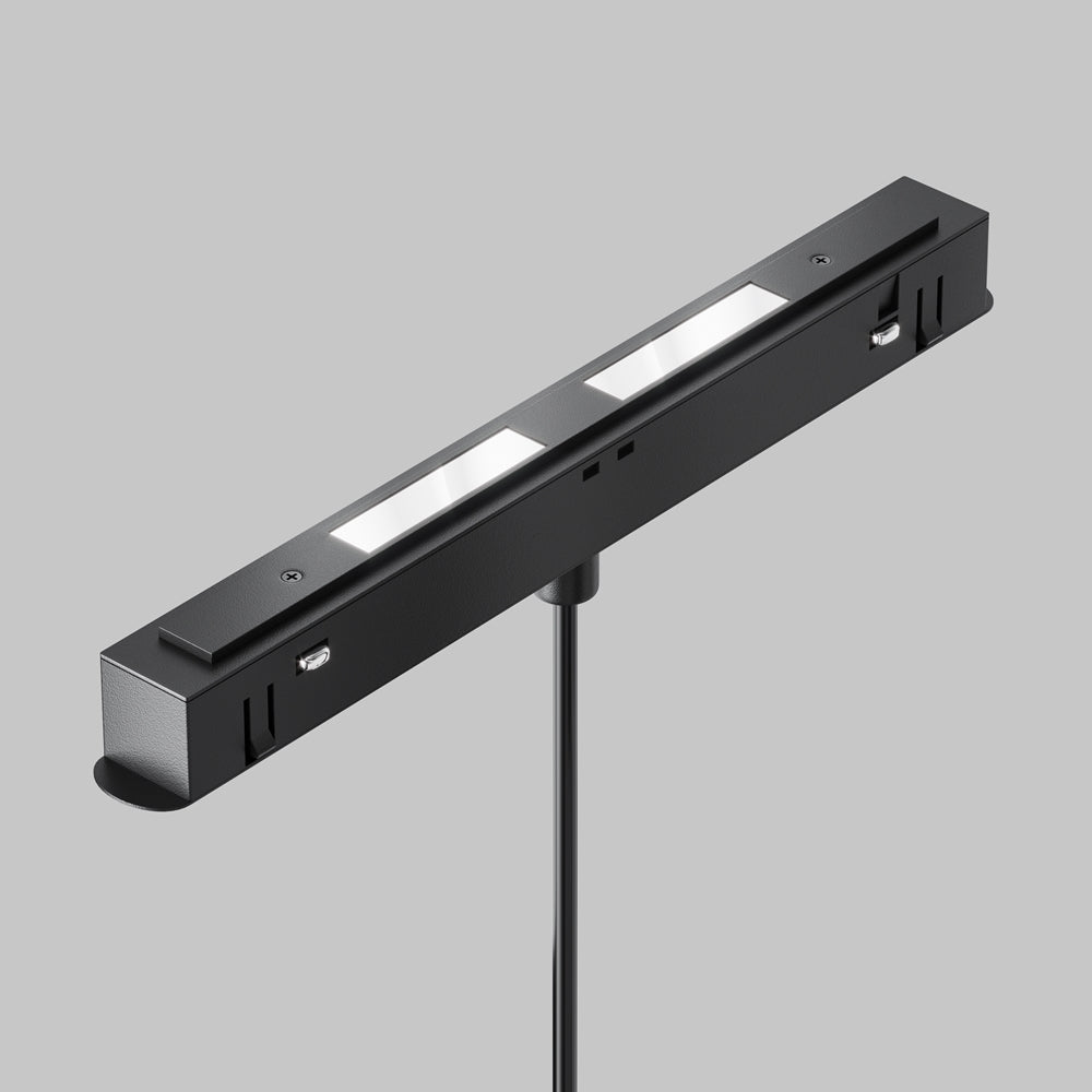 Détail technique du boîtier rectangulaire noir avec bandeaux LED et vis de fixation