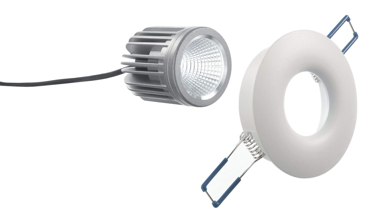 Vue éclatée montrant module LED à ailettes et collerette blanche avec ressorts bleus