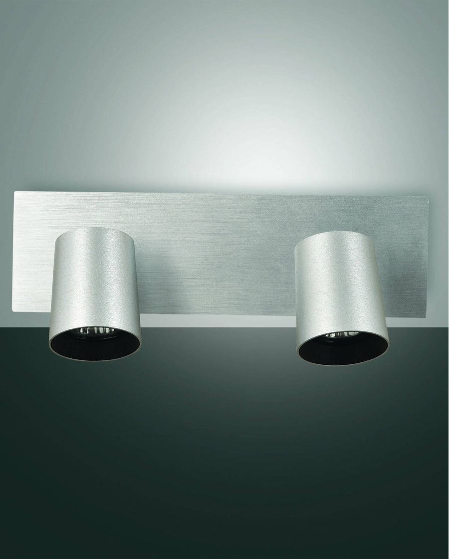 Vue de face du spot double en aluminium brossé, deux cylindres orientables sur platine rectangulaire