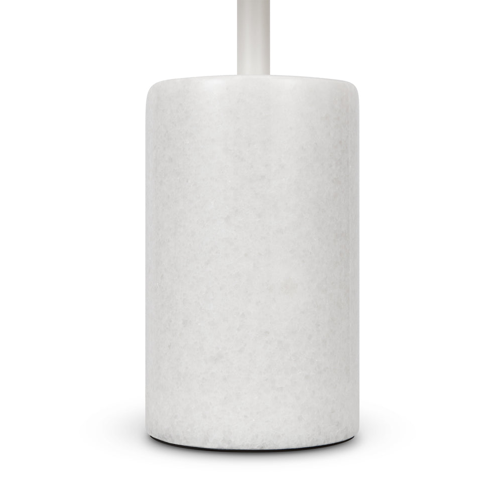 Gros plan sur la base cylindrique blanche au veinage de marbre