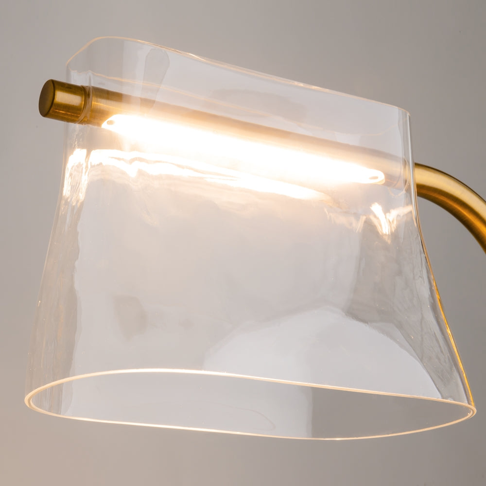 Détail de la source LED intégrée sous l'abat-jour en verre clair