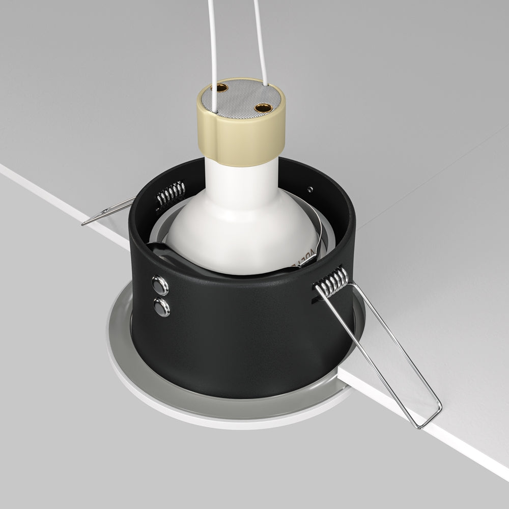 Vue arrière montrant le boîtier noir, l'ampoule et les ressorts de fixation