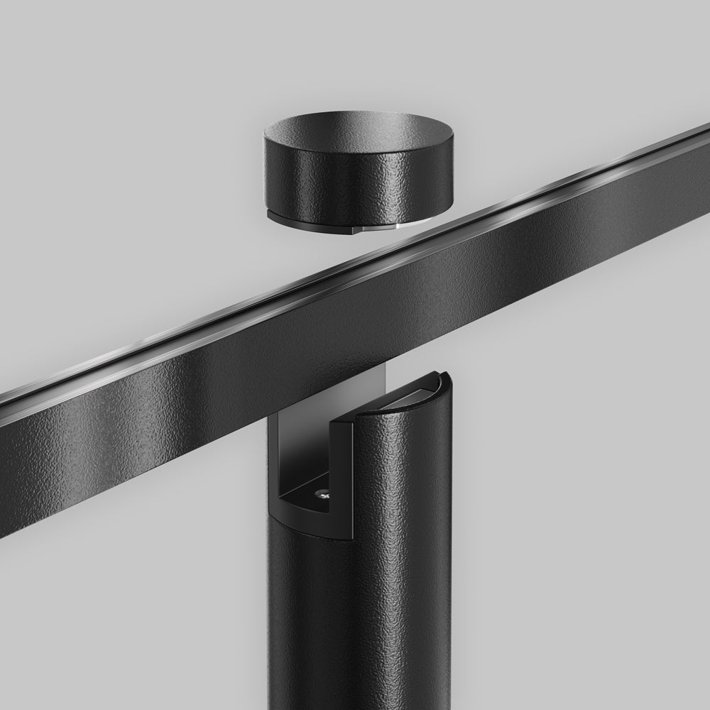 Détail de l'adaptateur et du capuchon de fixation sur le rail