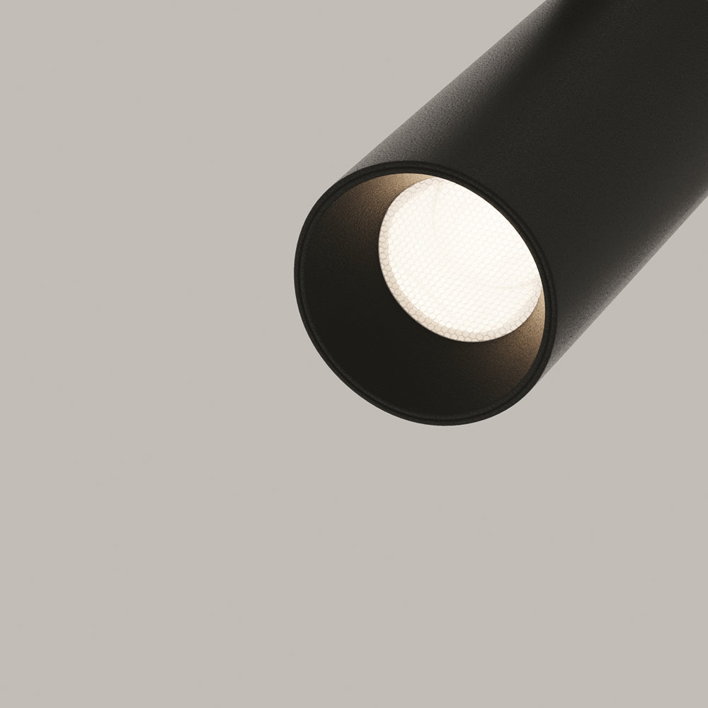 Détail de l'intérieur du cylindre noir et de la source LED allumée