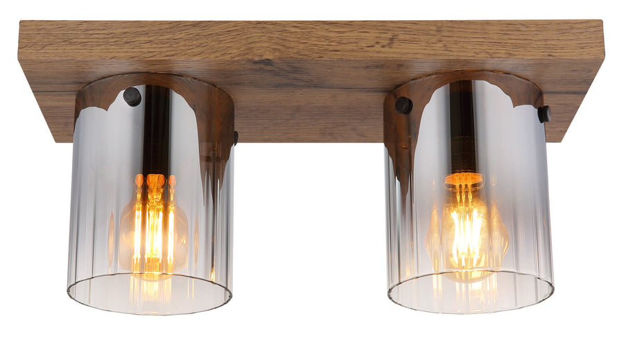 Détail de la finition : deux cylindres en verre et platine rectangulaire en bois.