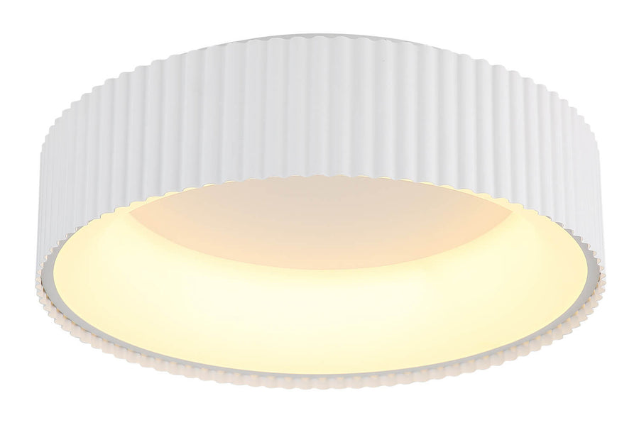 Détail du bord festonné et du diffuseur ivoire éclairé en lumière chaude.