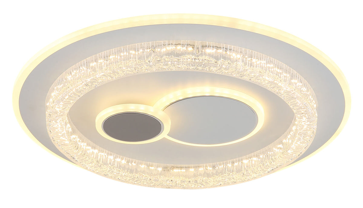 Vue allumée en lumière chaude révélant les LED sous l'anneau de verre