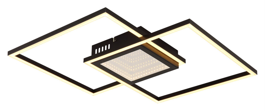 Luminaire allumé vu de trois quarts, diffusion chaude sur les cadres