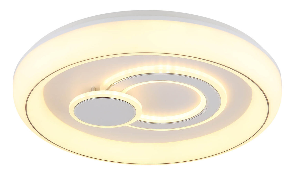 Détail du luminaire aux anneaux LED internes allumés, lumière chaude
