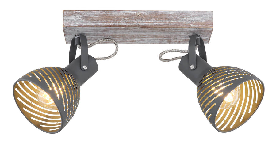 Vue de face des deux spots symétriques sur leur support en bois