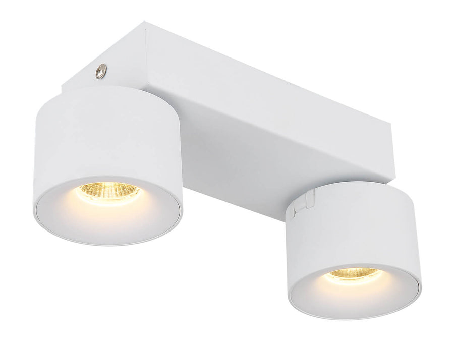 Vue en plongée du luminaire, base rectangulaire et spots cylindriques orientables blancs