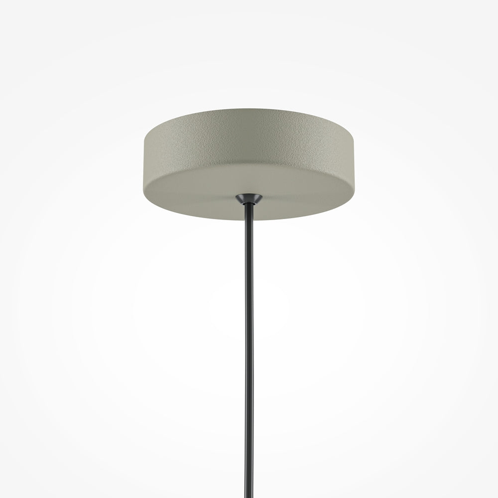 Détail de la rosace ronde beige fixée au plafond, tige fine